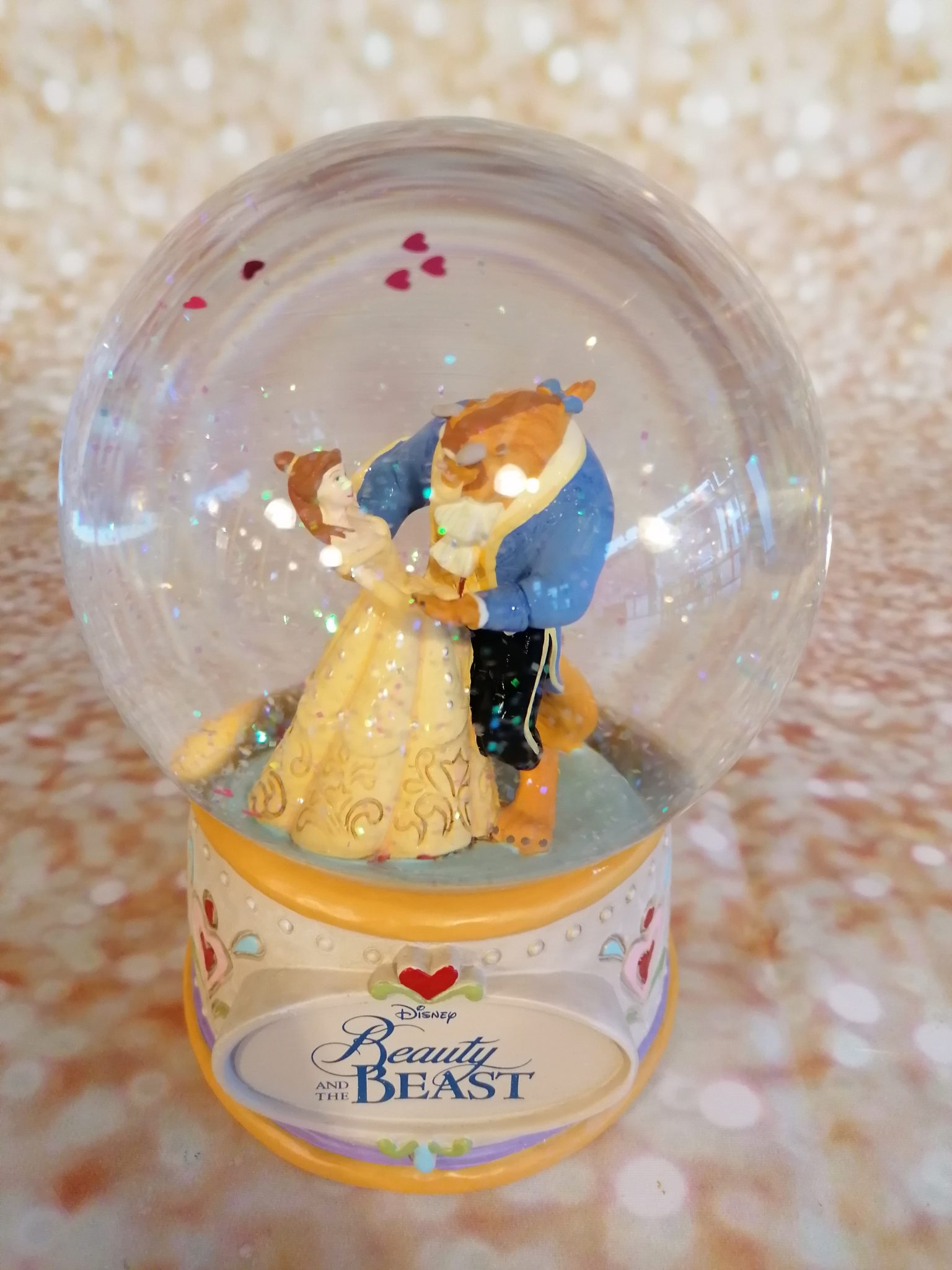 Boule à neige La Belle et la Bête - La Maison du Père Noël Boule à neige La Belle et la Bête - La Maison du Père Noël